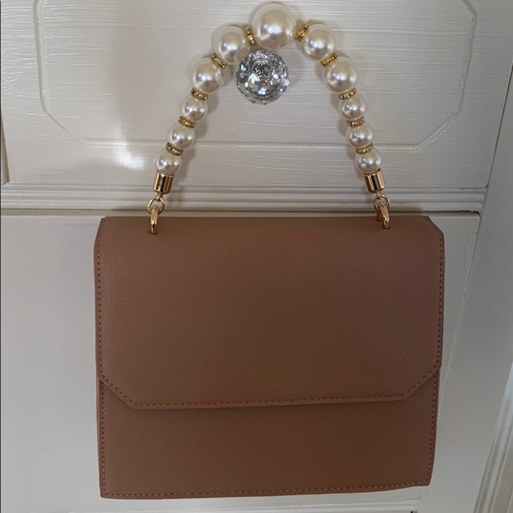 NWOT.    Beautiful pearl handled purse
